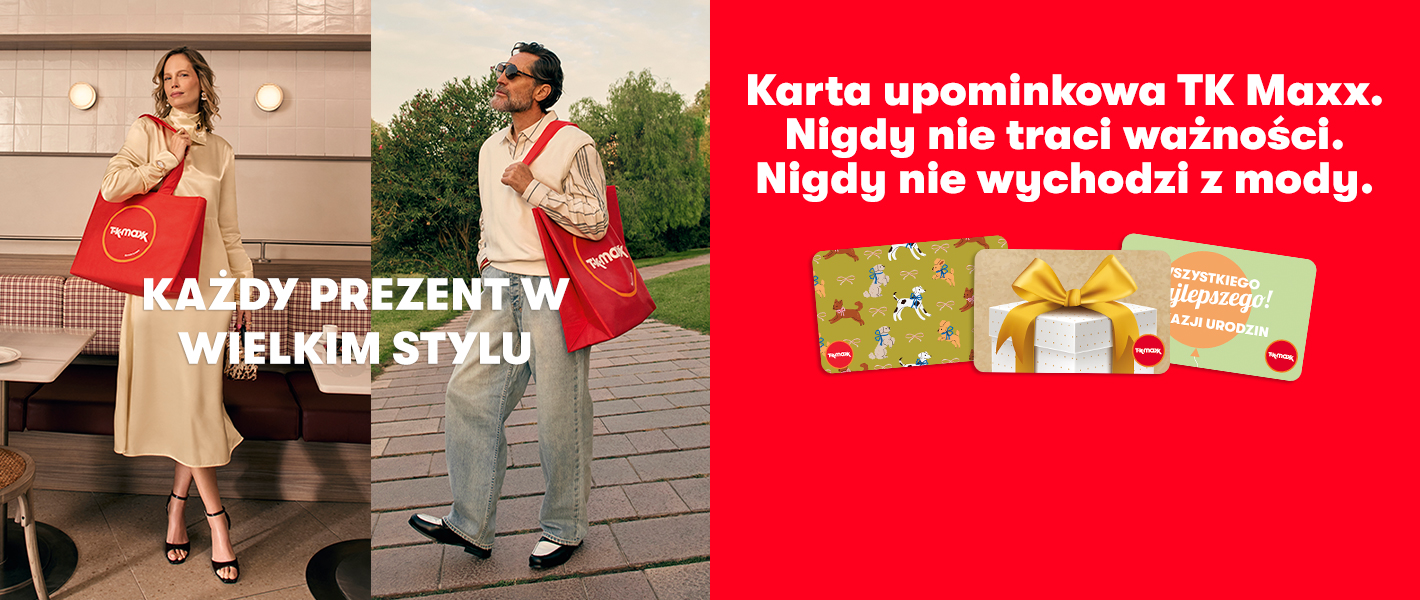 Stylowo ubrana kobieta obejmuje szarego pudla. Na zdjęciu znajduje się napis „KAŻDY PREZENT W WIELKIM STYLU. Karta upominkowa TK Maxx nigdy nie wychodzi z mody”.